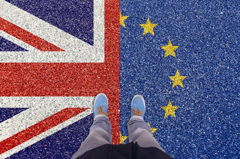 EU and UK flag on the sidewalk