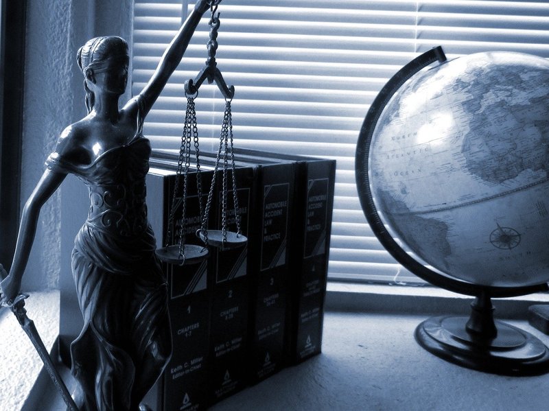 Statue of justice and globe