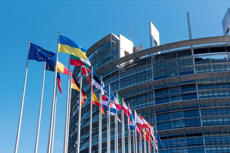 Flags in front of the European Parliament