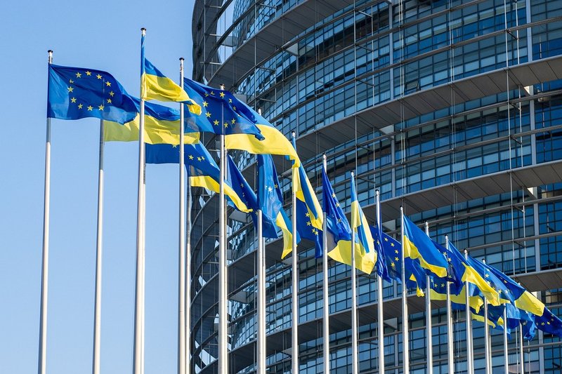 Flags EU and Ukraine in front of the European Parliament